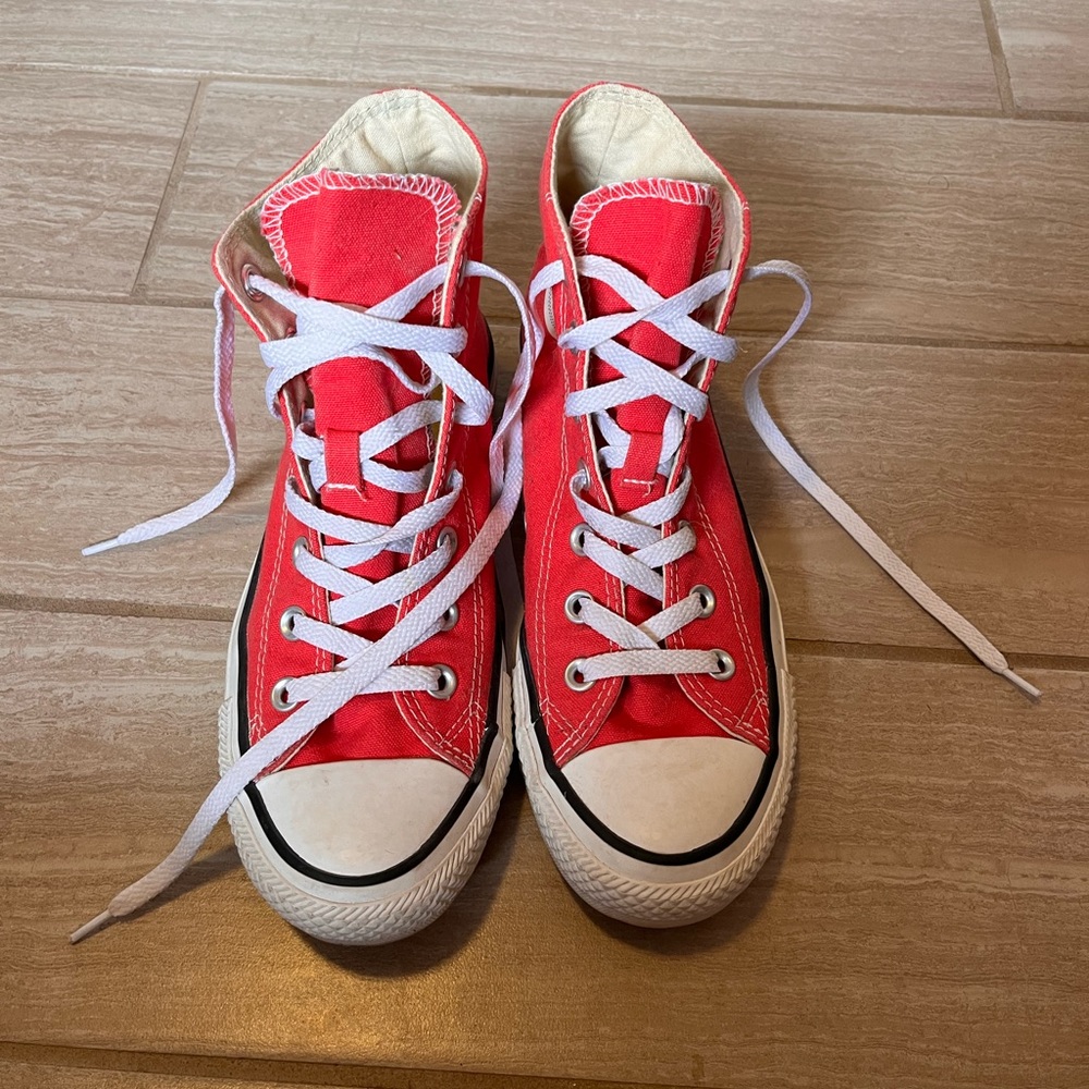 Pink size 8 high top converse sneakers. Worn once